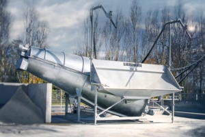 Le système de Liebherr permet l'ajout d’une trémie apte à  gérer jusqu'à 6 toupies en parallèle. [©Liebherr]