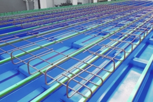 Les treillis sont soigneusement pliés grâce à la machine à souder de Progress Group. [©Progress group]